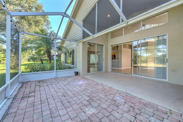 unfurnished sunroom with lofted ceiling and a wealth of natural light