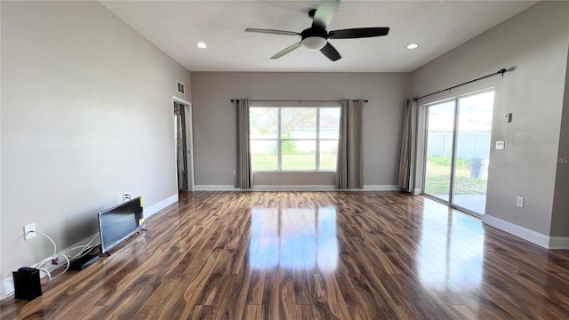 2012 Fern Ridge Ct, Holiday, FL 34691 - unfurnished room with ceiling fan, wood finished floors, baseboards, recessed lighting, and a textured ceiling