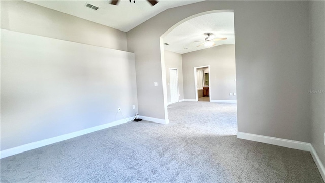 2012 Fern Ridge Ct, Holiday, FL 34691 - unfurnished room with a ceiling fan, carpet floors, arched walkways, and baseboards