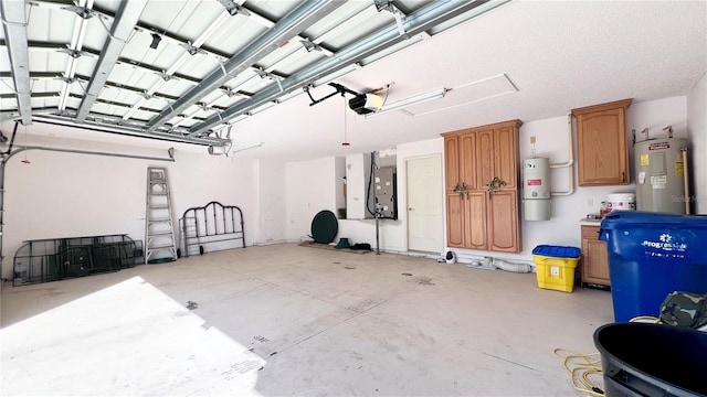 2012 Fern Ridge Ct, Holiday, FL 34691 - garage with electric water heater, a garage door opener, and a central vacuum unit