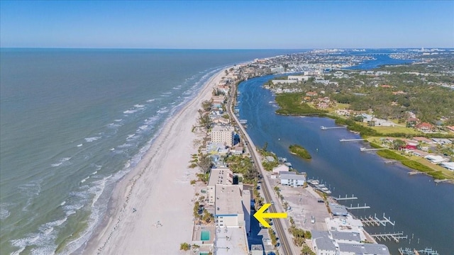 aerial view featuring a view of the beach and a water view