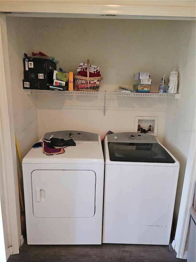1252 Costa Mesa Dr, Wesley Chapel, FL 33543 - washroom with washer and clothes dryer and dark wood finished floors