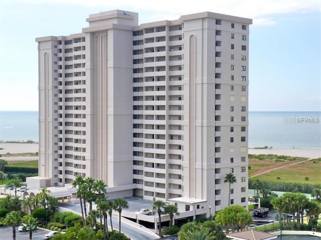 view of building exterior with a water view