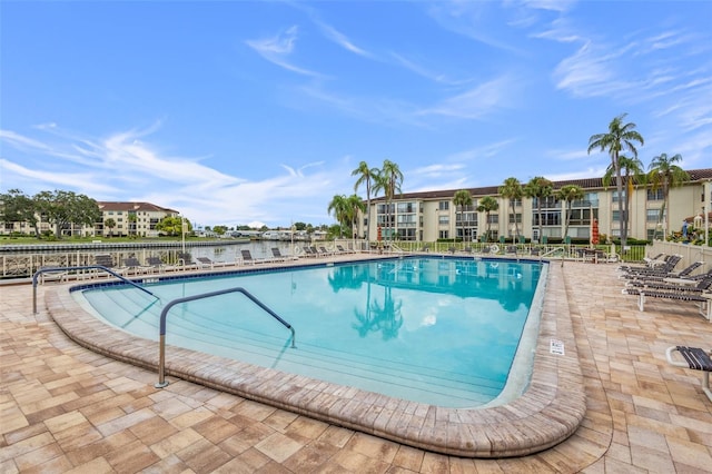 view of swimming pool featuring a patio