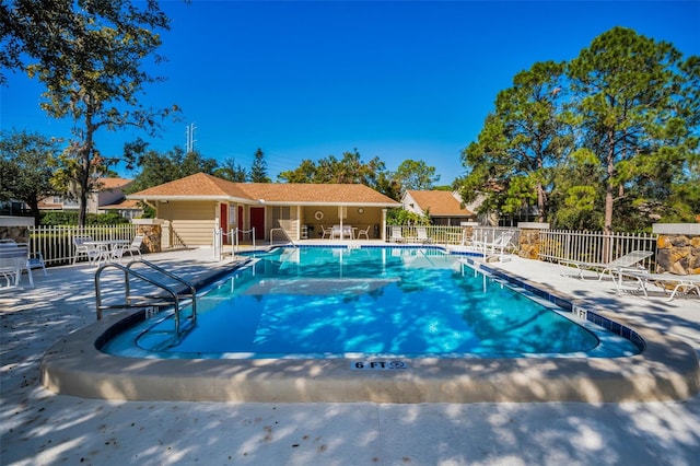 view of pool with a patio area