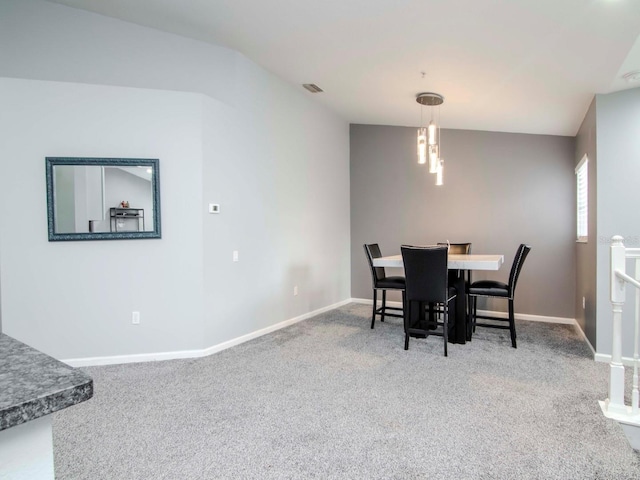 dining area with carpet