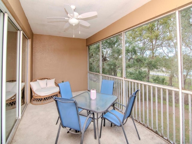 sunroom / solarium with ceiling fan