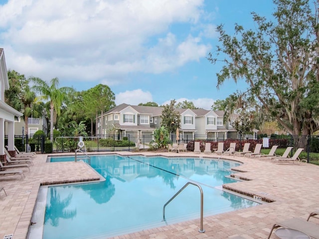 view of pool featuring a patio