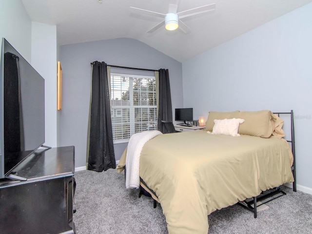 carpeted bedroom featuring ceiling fan and lofted ceiling