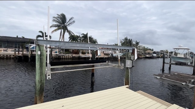 view of dock with a water view