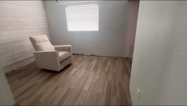 living area with light hardwood / wood-style floors