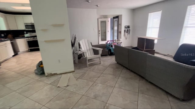 living room featuring light tile patterned flooring