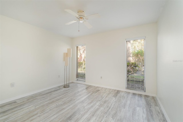 unfurnished room with ceiling fan and light hardwood / wood-style floors