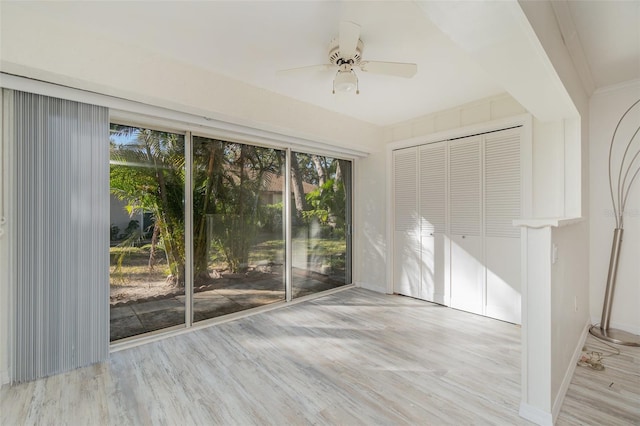 interior space featuring ceiling fan and light hardwood / wood-style floors