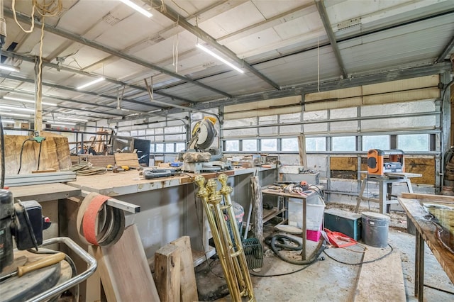 interior space with concrete flooring and a workshop area