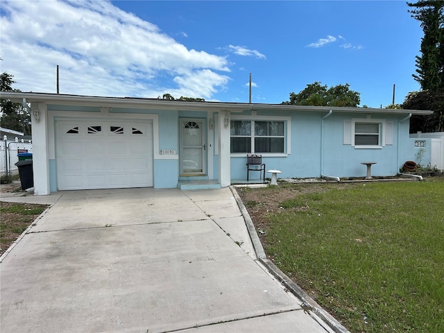 10170 64th Ave, Seminole, FL 33772 - ranch-style house with stucco siding, a garage, and concrete driveway