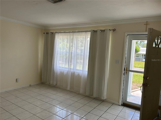 10170 64th Ave, Seminole, FL 33772 - spare room featuring light tile patterned flooring, crown molding, and baseboards