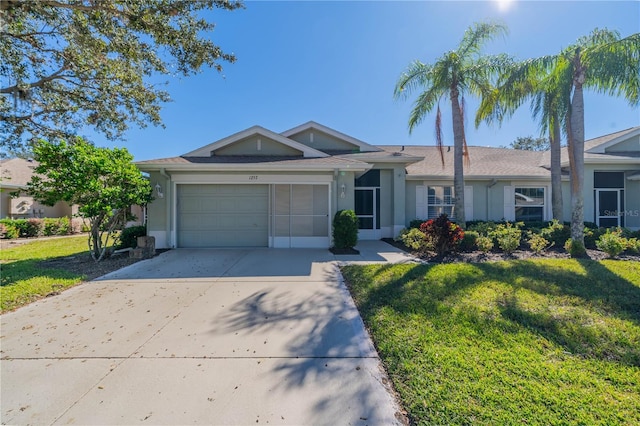 1257 Corinth Greens Dr Unit 1257, Sun City Center, FL 33573 - ranch-style house with stucco siding, concrete driveway, a front lawn, and an attached garage