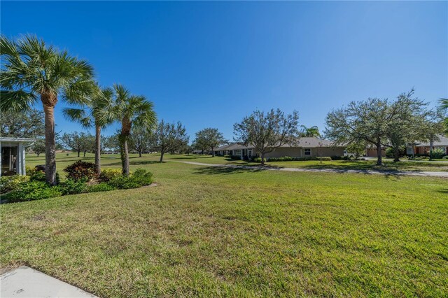 1257 Corinth Greens Dr Unit 1257, Sun City Center, FL 33573 - view of grassy yard