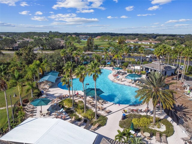 1257 Corinth Greens Dr Unit 1257, Sun City Center, FL 33573 - drone / aerial view of a pool area