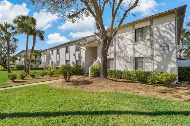 122 E Cypress Ct Unit 22, Oldsmar, FL 34677 - view of property featuring stairs
