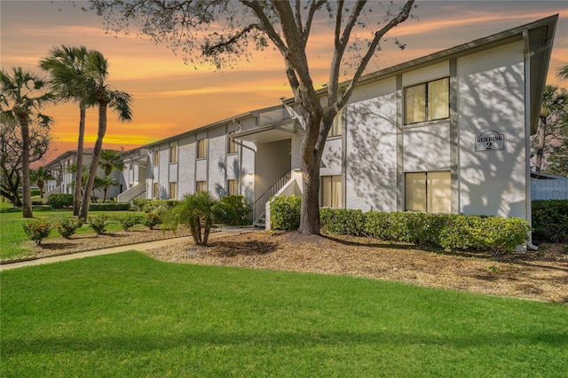 122 E Cypress Ct Unit 22, Oldsmar, FL 34677 - property at dusk featuring stairs