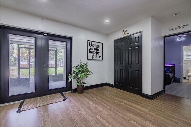 foyer featuring french doors and hardwood / wood-style flooring