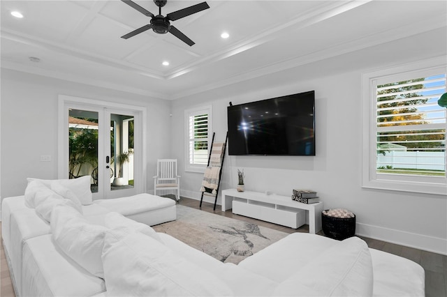 living room featuring ceiling fan, wood-type flooring, crown molding, and french doors