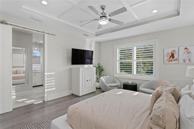 bedroom featuring hardwood / wood-style flooring, ceiling fan, and coffered ceiling