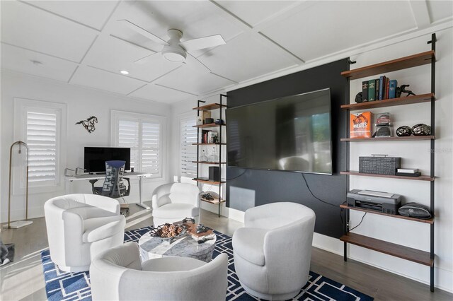 living room with hardwood / wood-style flooring, ceiling fan, and coffered ceiling