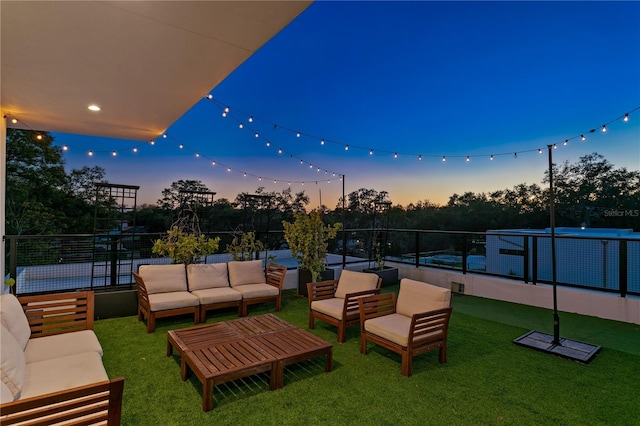 exterior space featuring an outdoor living space and a yard