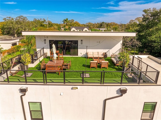 view of property's community with a lawn