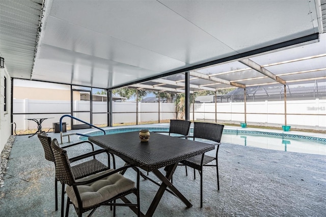 sunroom with a swimming pool