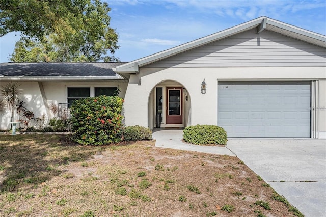 ranch-style home with a garage