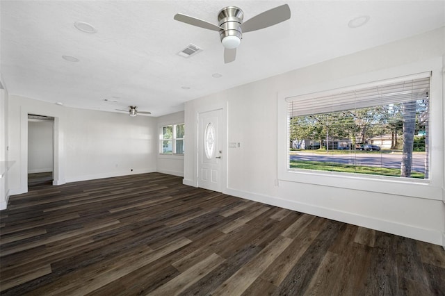 entrance foyer featuring dark wood-type flooring and ceiling fan