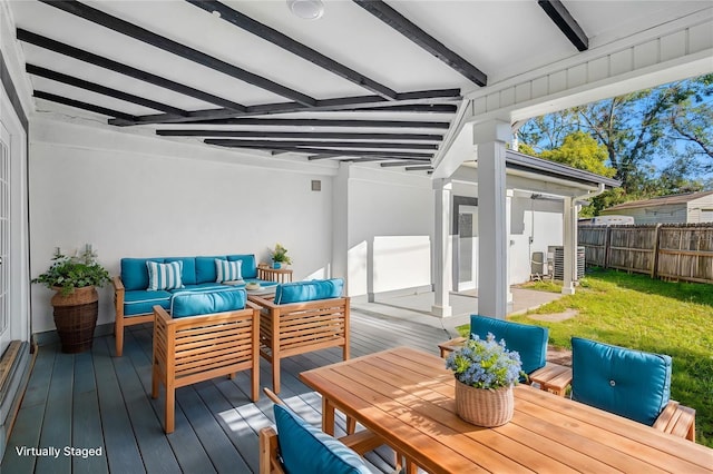 wooden terrace featuring outdoor lounge area, a yard, and cooling unit