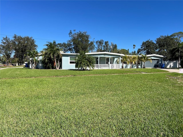 view of front of home featuring a porch and a front yard