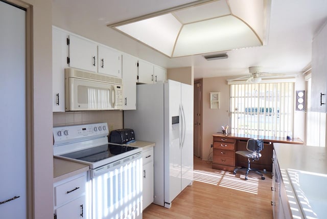 kitchen featuring ceiling fan, light hardwood / wood-style flooring, backsplash, white appliances, and white cabinets