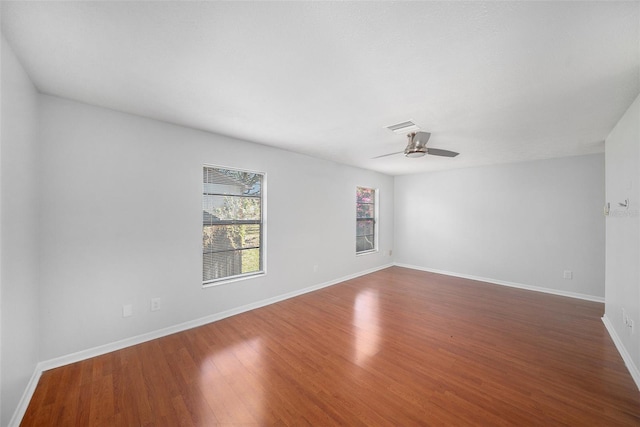 unfurnished room featuring hardwood / wood-style flooring and ceiling fan