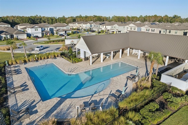 view of swimming pool featuring a patio area