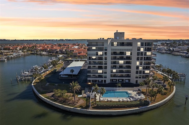 aerial view at dusk with a water view