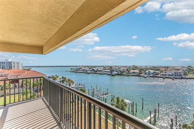 balcony featuring a water view