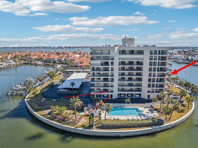 birds eye view of property featuring a water view