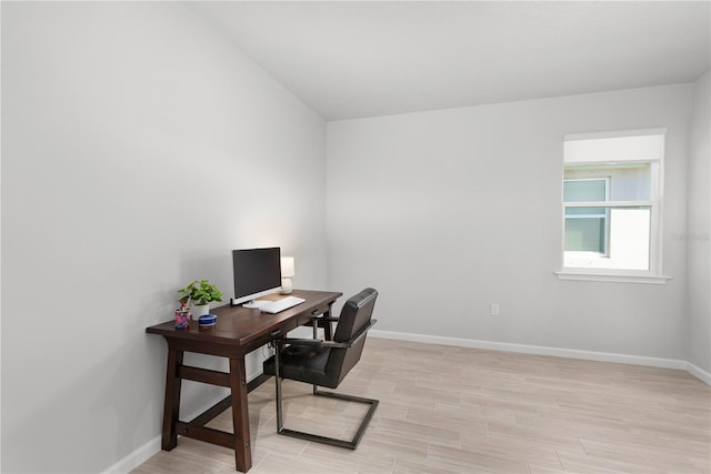 office space featuring light hardwood / wood-style floors