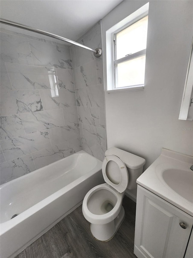 150 Peachtree St, Cocoa, FL 32922 - full bathroom with toilet, vanity, and bathing tub / shower combination