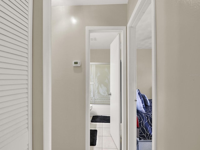 hallway with light tile patterned floors