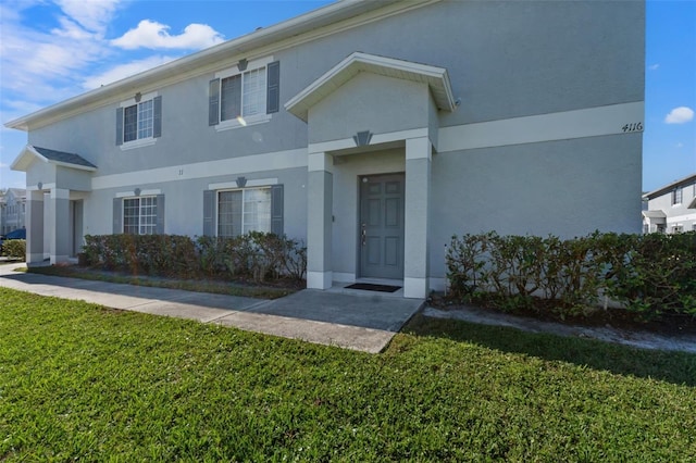 view of front of property with a front lawn