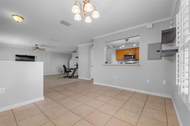 unfurnished room featuring electric panel, crown molding, light tile patterned floors, and ceiling fan with notable chandelier