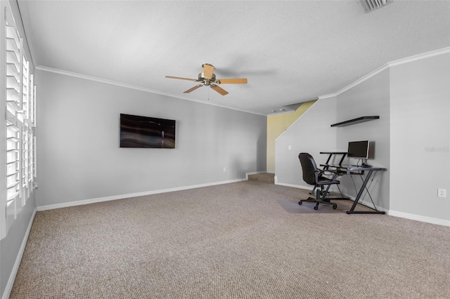 unfurnished office featuring a healthy amount of sunlight, carpet floors, and crown molding