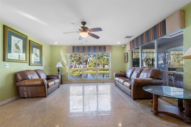 living room featuring ceiling fan